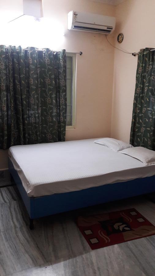 Shanti Guesthouse Bhubaneswar Quarto foto
